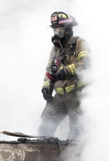 Fireman Standing in Smoke