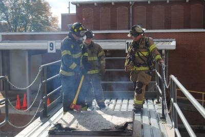 Firemen Training with Axe