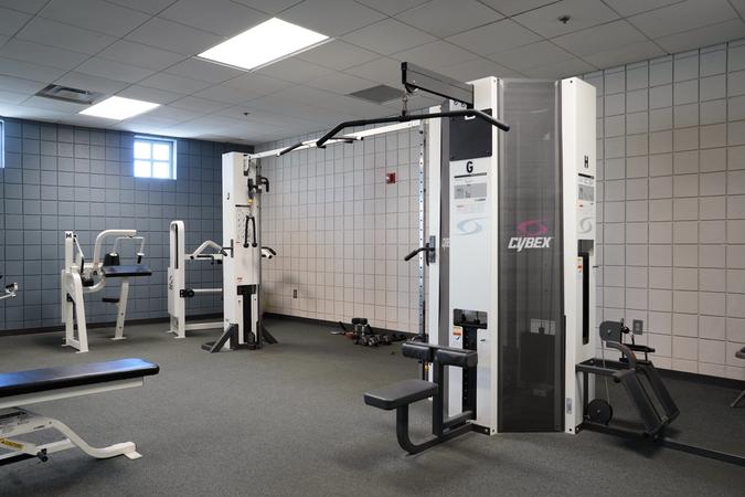A Cybex six-station multipurpose exercise machine in the fitness room.
